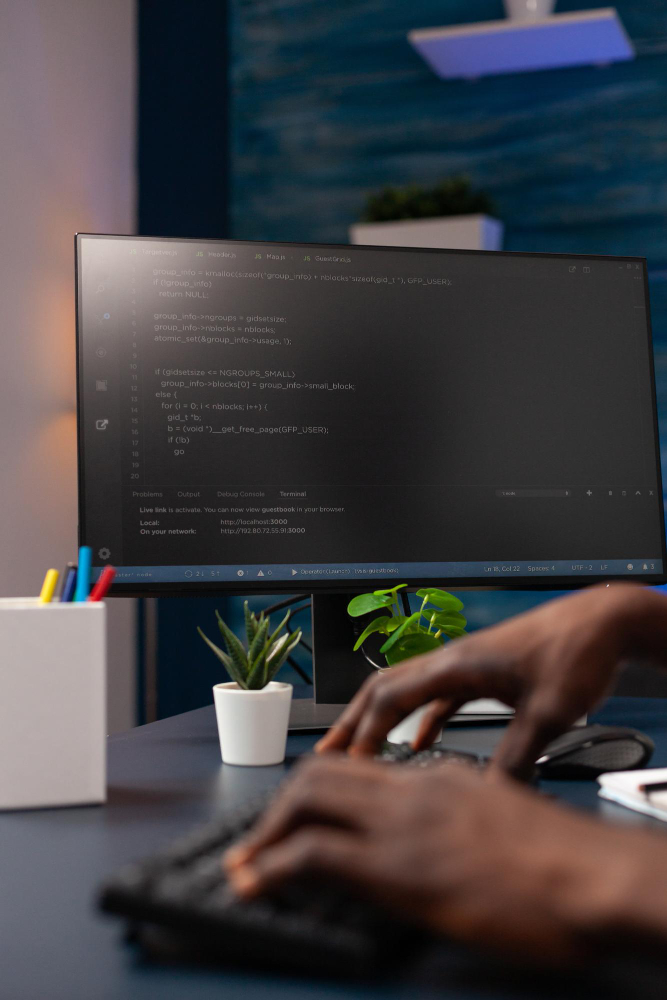 closeup-programmer-man-hand-typing-website-script-computer-working-remote-from-home-african-american-hacker-worker-programming-binary-code-using-network-security-system-concept-coding